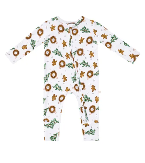 Flat lay photography of a printed baby sleeper photographed for infant apparel e-commerce photography.