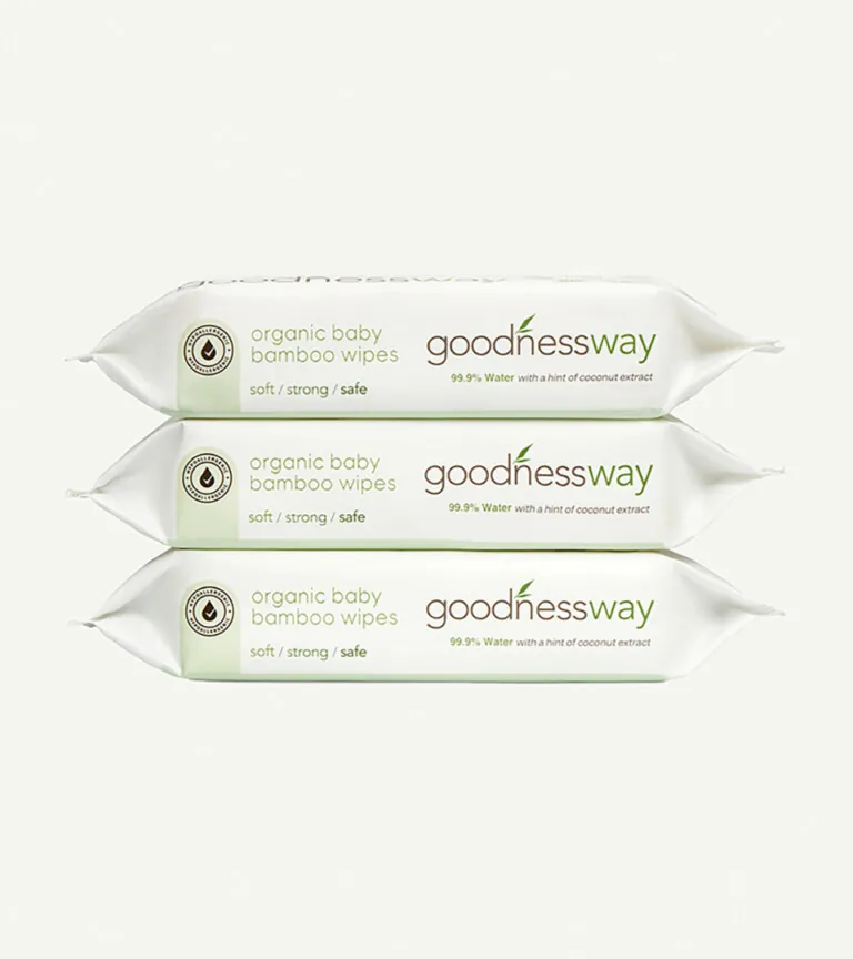 three stacked packs of organic baby bamboo wipes on white background for Amazon product photography