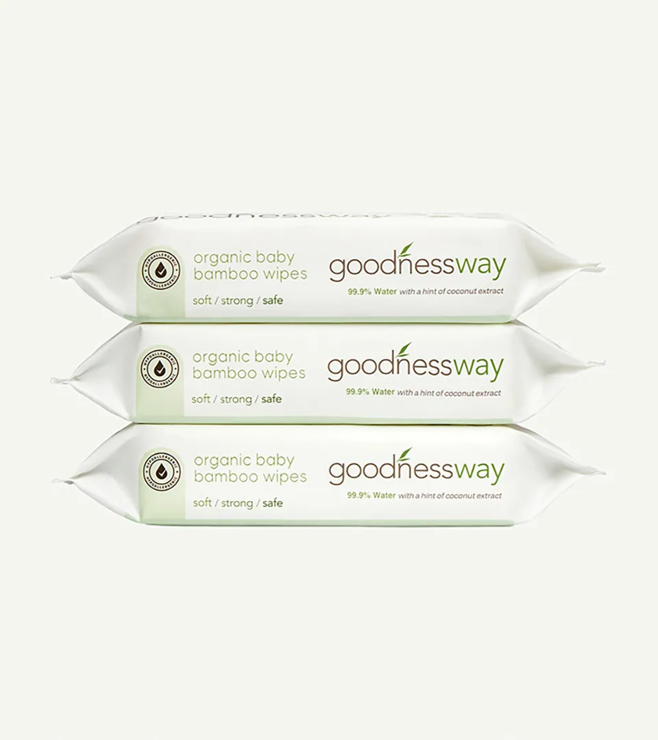 three stacked packs of organic baby bamboo wipes on white background for Amazon product photography