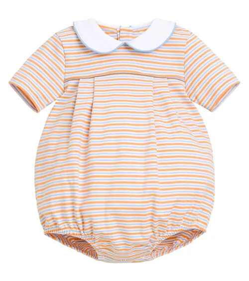 flat lay photography of an orange striped baby romper